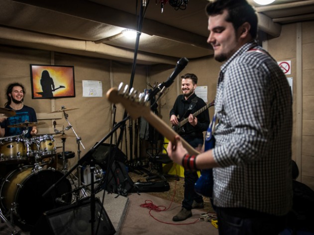 Yevhen Revko, 22 Bassist in Urban FM (center) practices with his band.