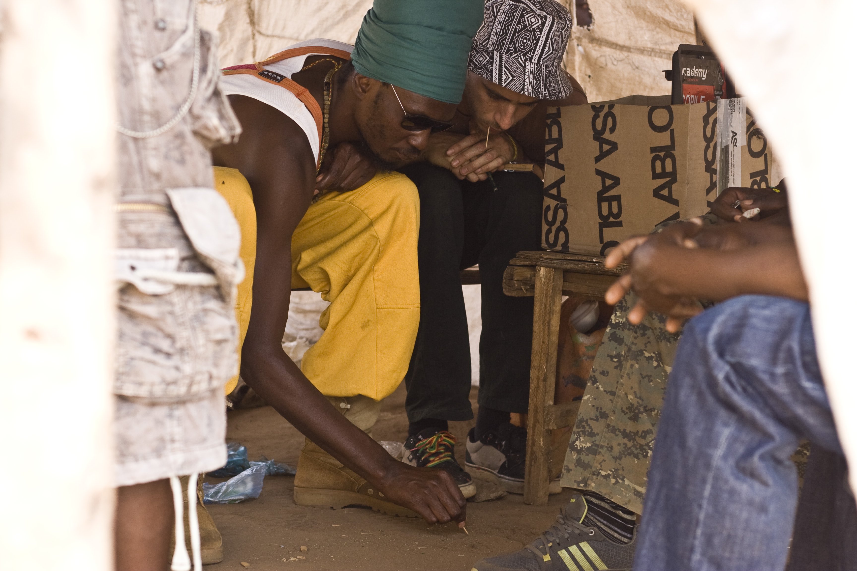 mook and raz planning in the sand_be happy barber shop_lilongwe tsoka market