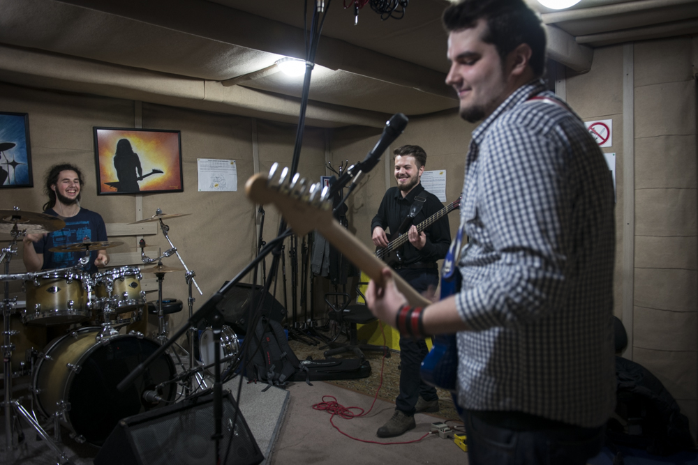 Yevhen Revko, 22 Bassist in Urban FM (center) practices with his band.
