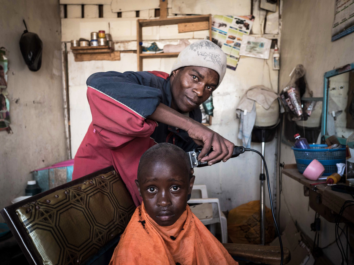 Alex 'Ras' Muthoni, 26, barber. "Most people just call me Ras because I’m a Rastafari. And there aren’t that many of us in Naro Moru. Maybe twenty. Naro Moru is a small town. The other people here respect us. They know Rastafari don’t cause trouble. And our philosophy is all about peace and harmony... There’s a lot of competition among the barber shops in Naro Moru, but I don’t really try to attract new customers – they come to me thanks to Jah. But people also appreciate my service. My brother trained me well. I dropped out of school early. I grew up with my grandparents who didn’t have much money. And when you’re from the slum, no one wants to hire you. Now I have my own business as a barber. I want to introduce myself to my girl- friend’s parents soon. That’s when things will get serious."