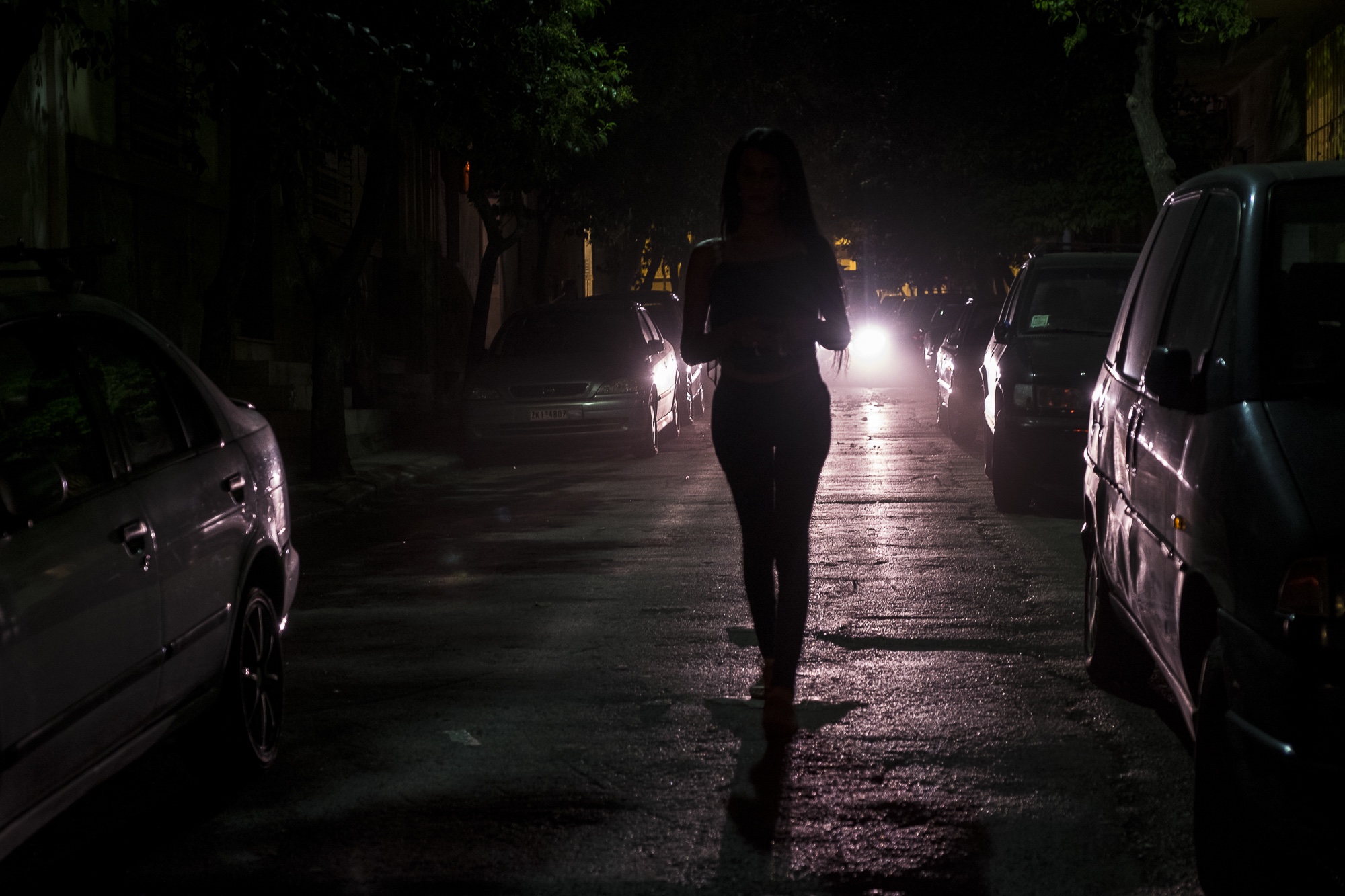 A., 24, a trans woman from the Middle East (who asked not to have her nationality revealed for security reasons), walks down the street on her way to meet some friends at a bar in Athens, Greece. August 6, 2017.